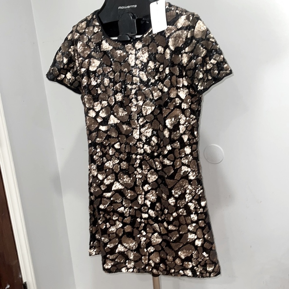 Dazzling black and gold mini  dress.